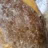 McDonald's - roach sack and looks like a piece of wood soak up in burger