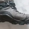 Ecco - a pair of walking boots.