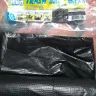 SM Supermalls - Black plastic trash bag with cross-tie