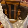 Michael Kors - Two different style handbags, handles/straps on both, cording edges came off