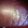 Ashley HomeStore - peeling couch